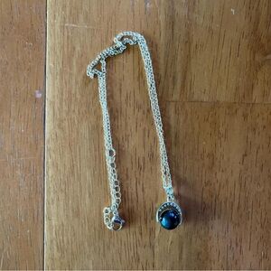 Elegant Silver Necklace with Black Pendant